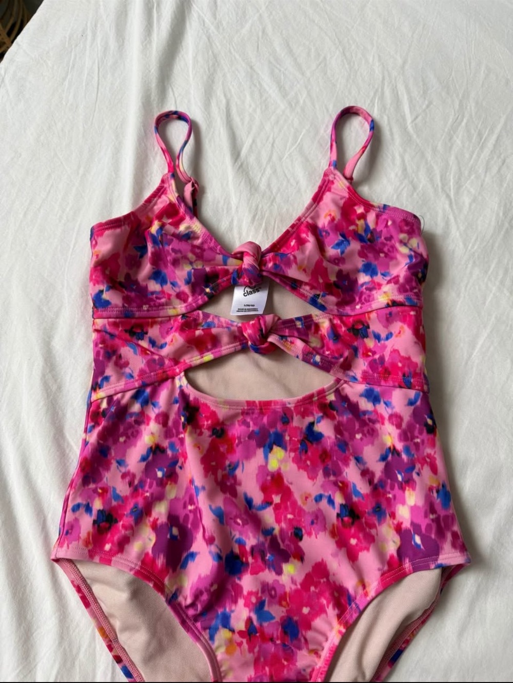 Girls Pink Floral One-Piece Swimsuit with Twist Cutouts
